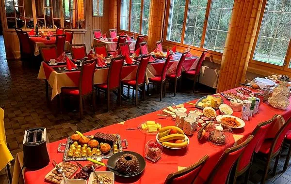 Festive buffet spread with regional specialties and traditional dishes, exemplifying the hearty, homemade cooking that defines Fontanne-Pintli's nine-decade legacy.